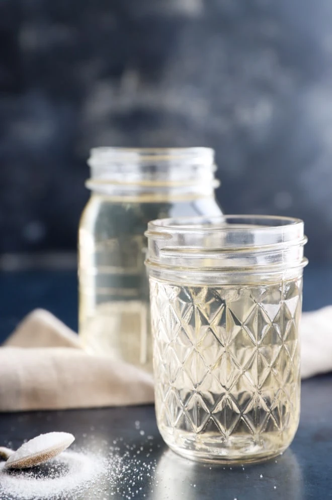 Image of simple syrup in jars for cocktails