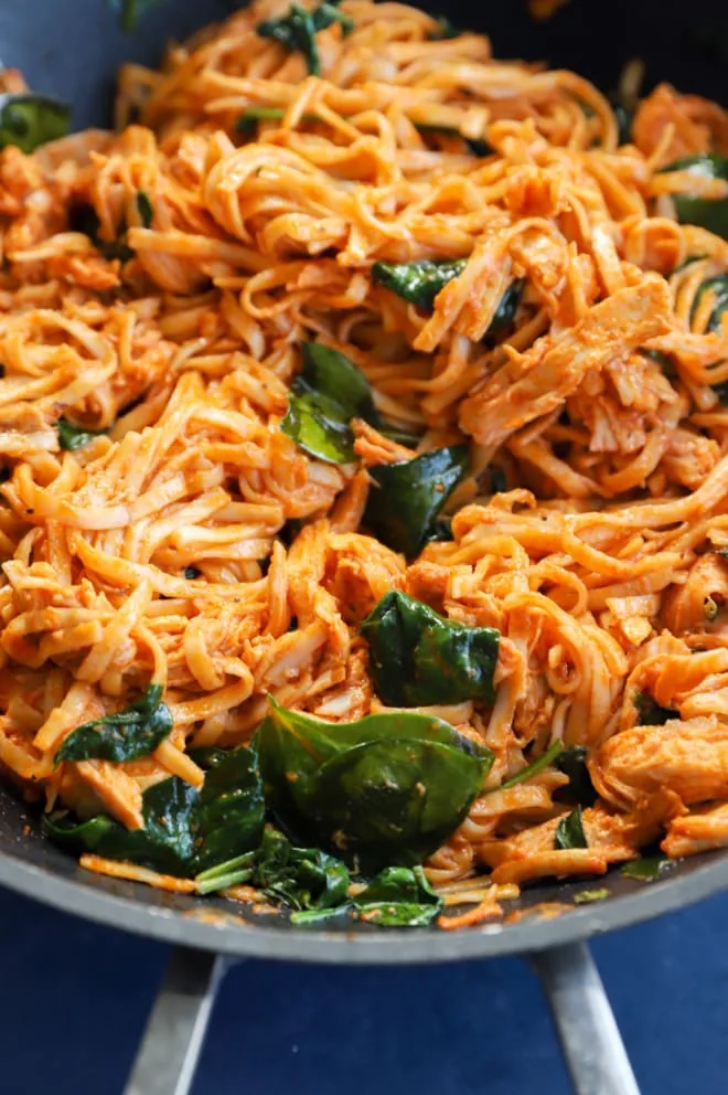 Ingredients for gochujang noodles in a wok