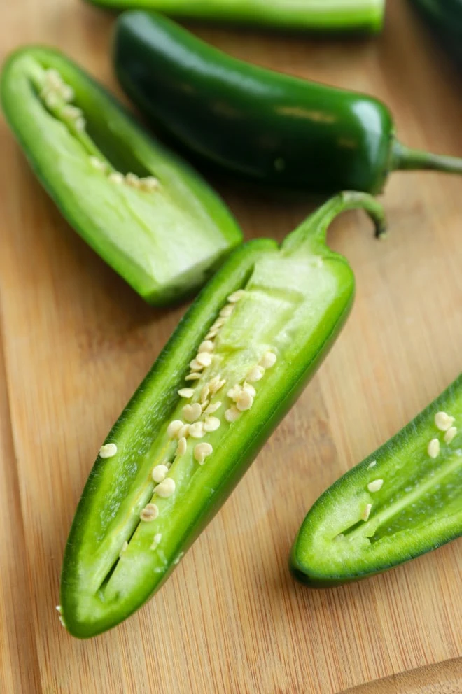 How to seed a jalapeño on a cutting board picture