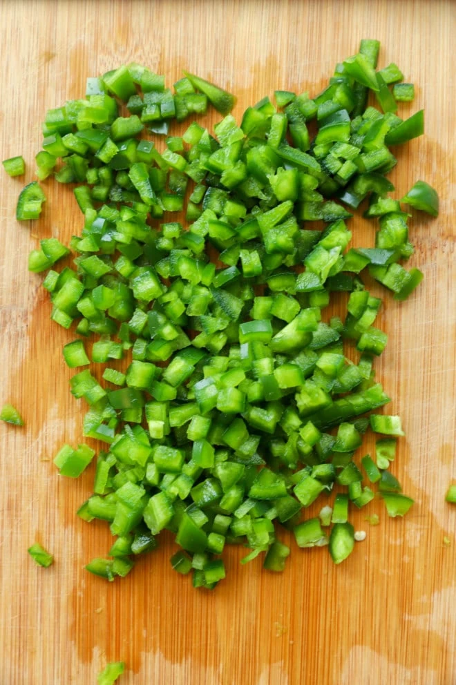 Overhead image of jalapeno peppers diced