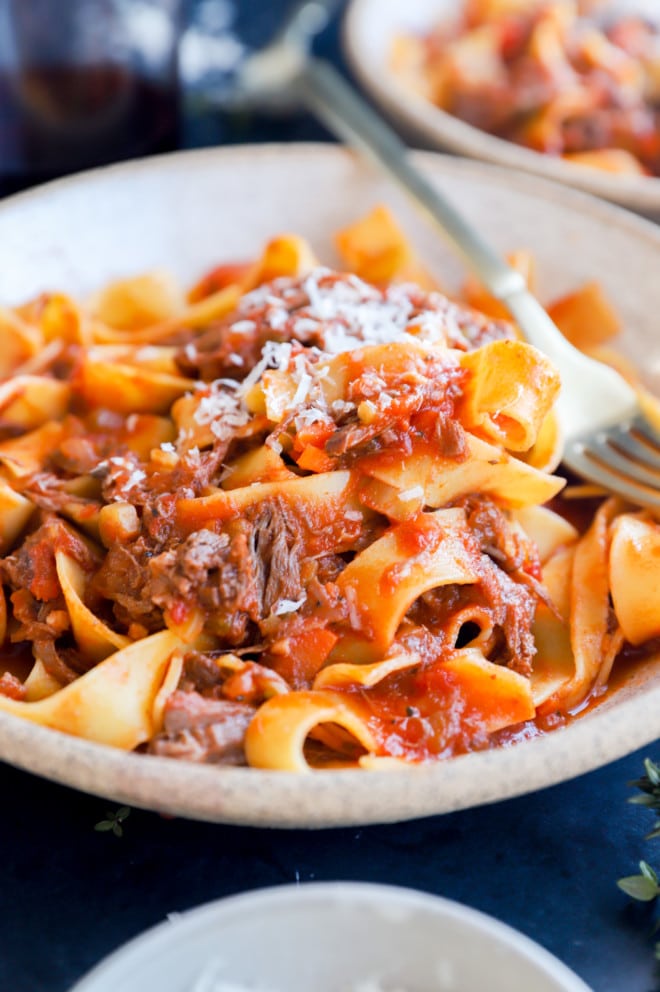 Beef short rib sauce with pasta in a bowl image