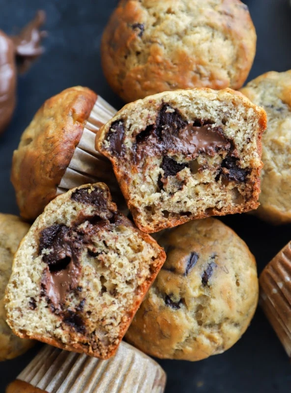 Banana muffins with chocolate chips and hazelnut spread in the center