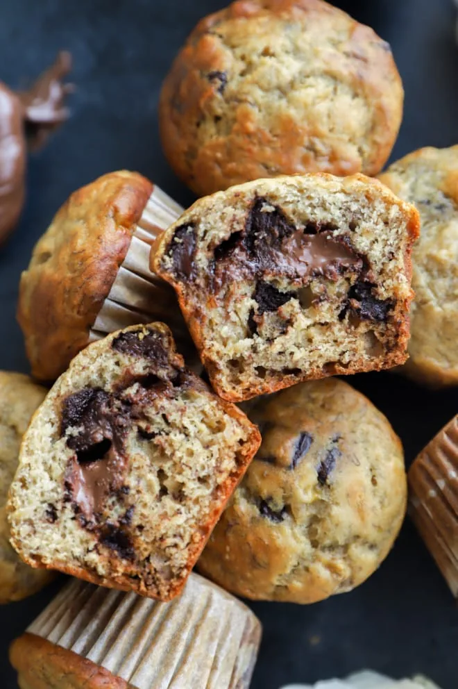 Banana muffins with chocolate chips and hazelnut spread in the center