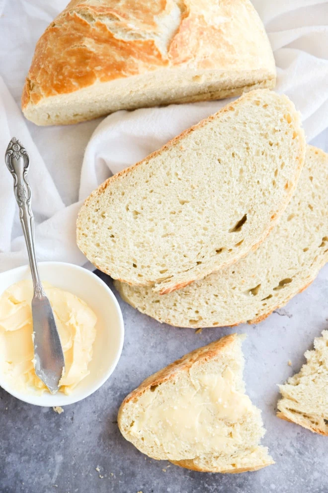 Butter and salt in a slice of overnight bread