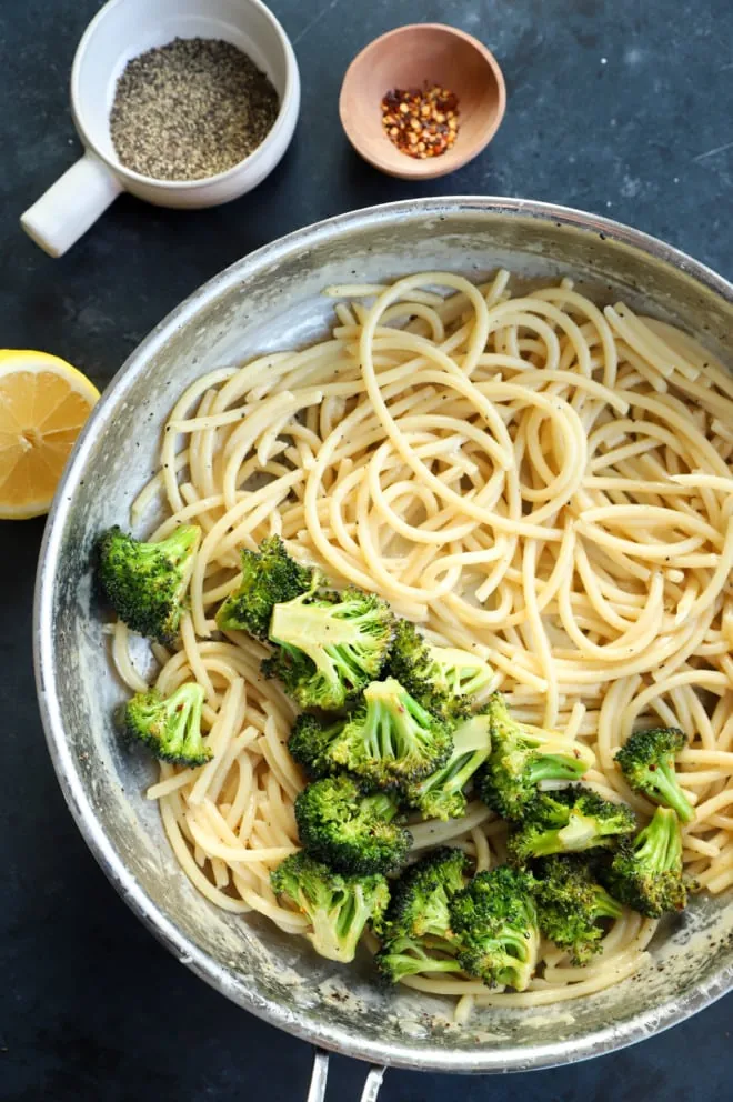 Image of pasta with broccoli in skillet