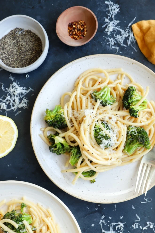 Plate of pasta with broccoli image with forks