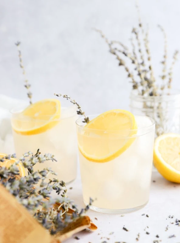 lavender lemonade cocktail in glasses image