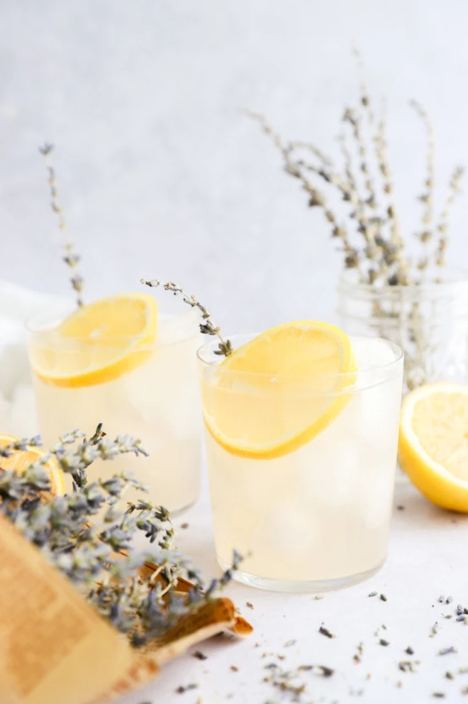 lavender lemonade cocktail in glasses image