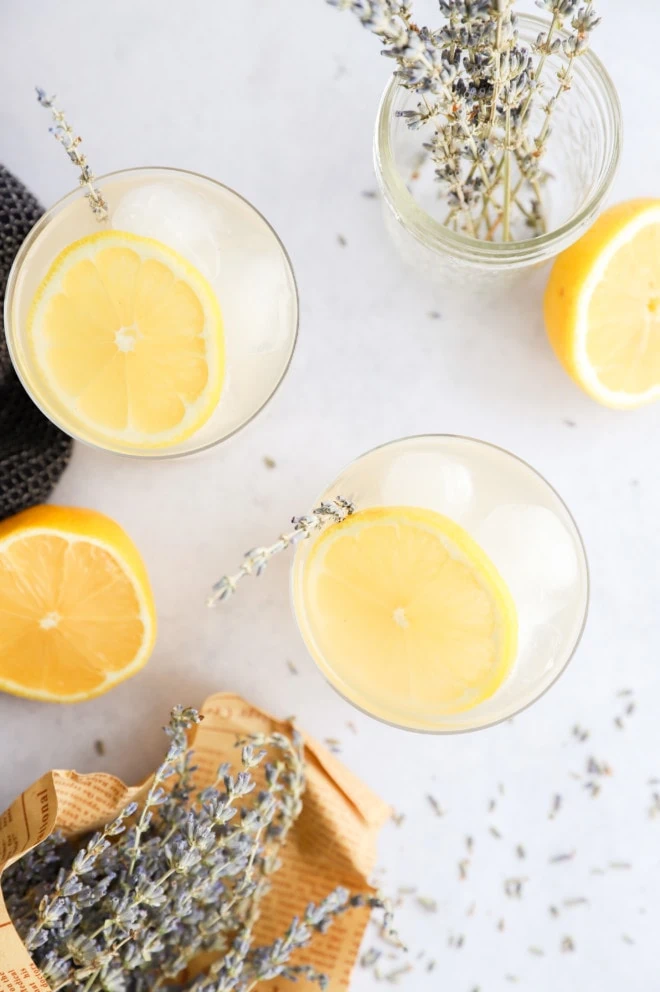Overhead image of lavender lemonade cocktail in glasses