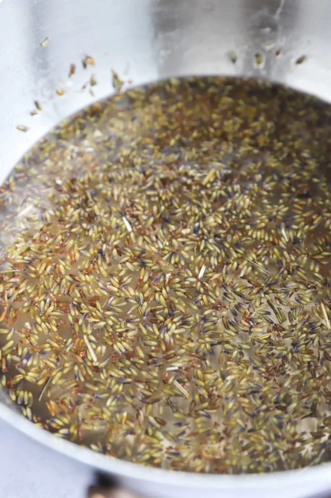 syrup cooking in pan with lavender buds image