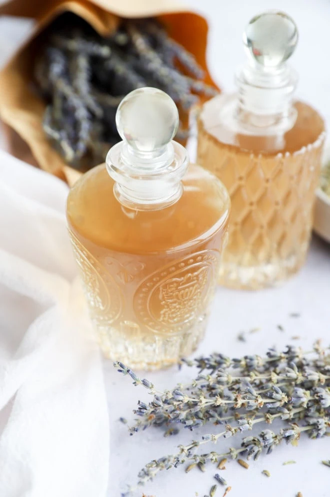 Lavender simple syrup in glass bottles image