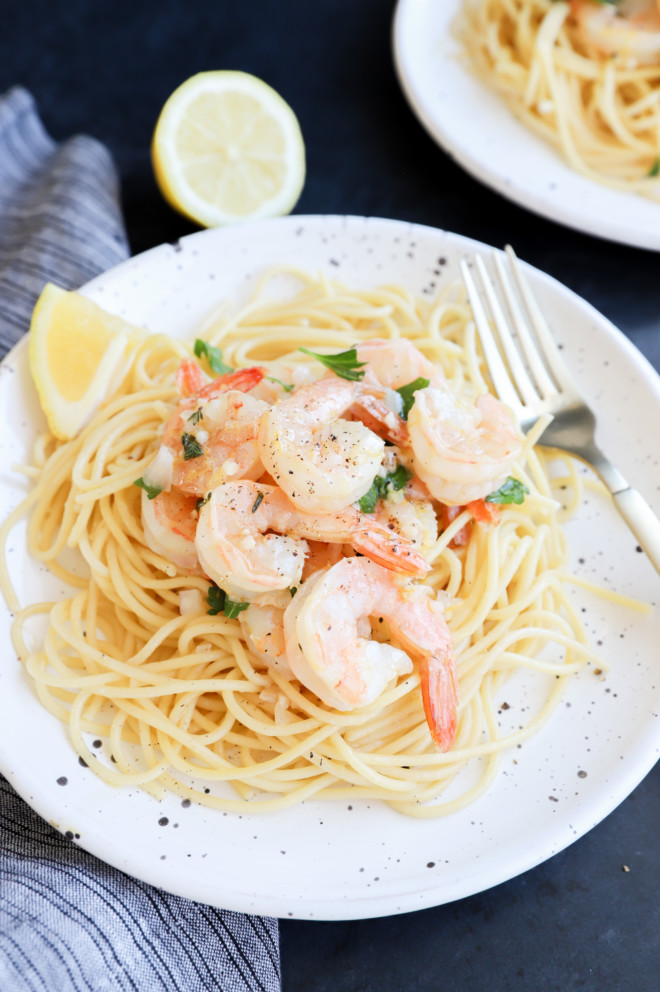 Side photo of shrimp on pasta with lemon picture