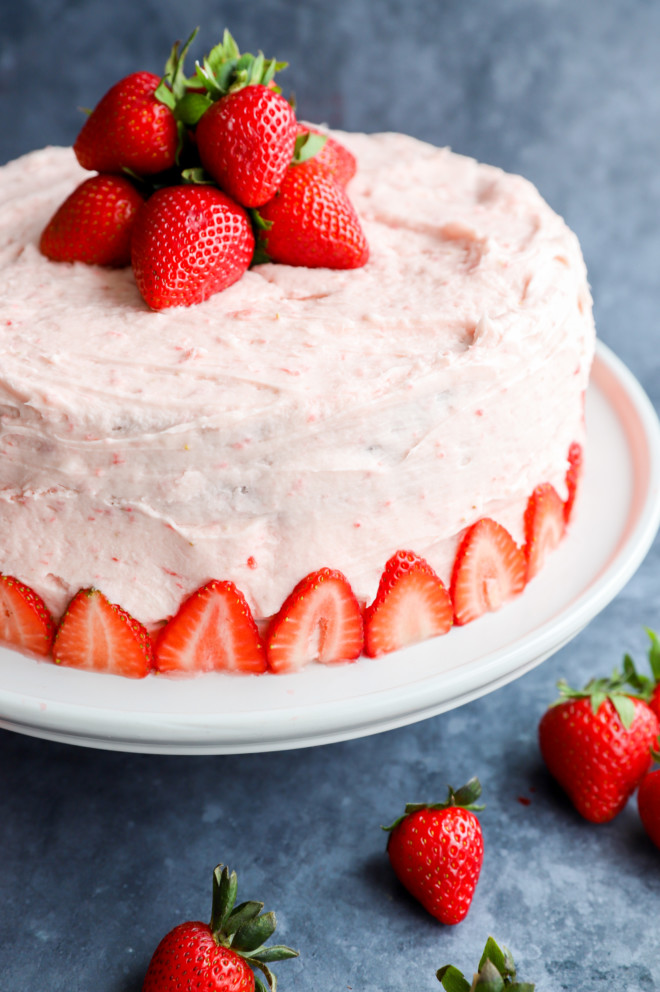 Fresh strawberry buttercream frosting on a chocolate cake picture