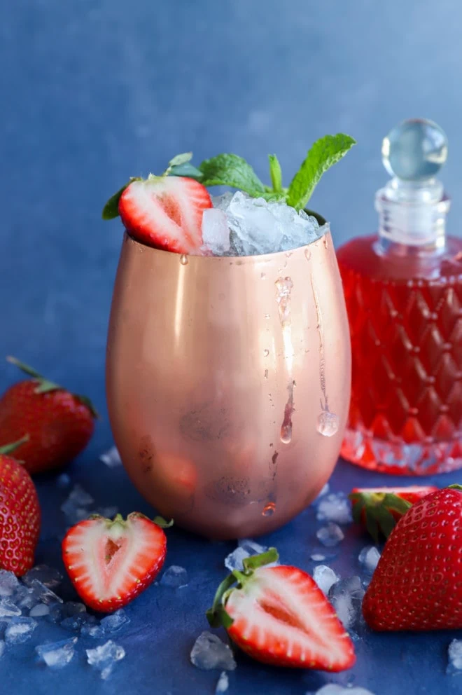 Picture of strawberry cocktail with fruity simple syrup in jar