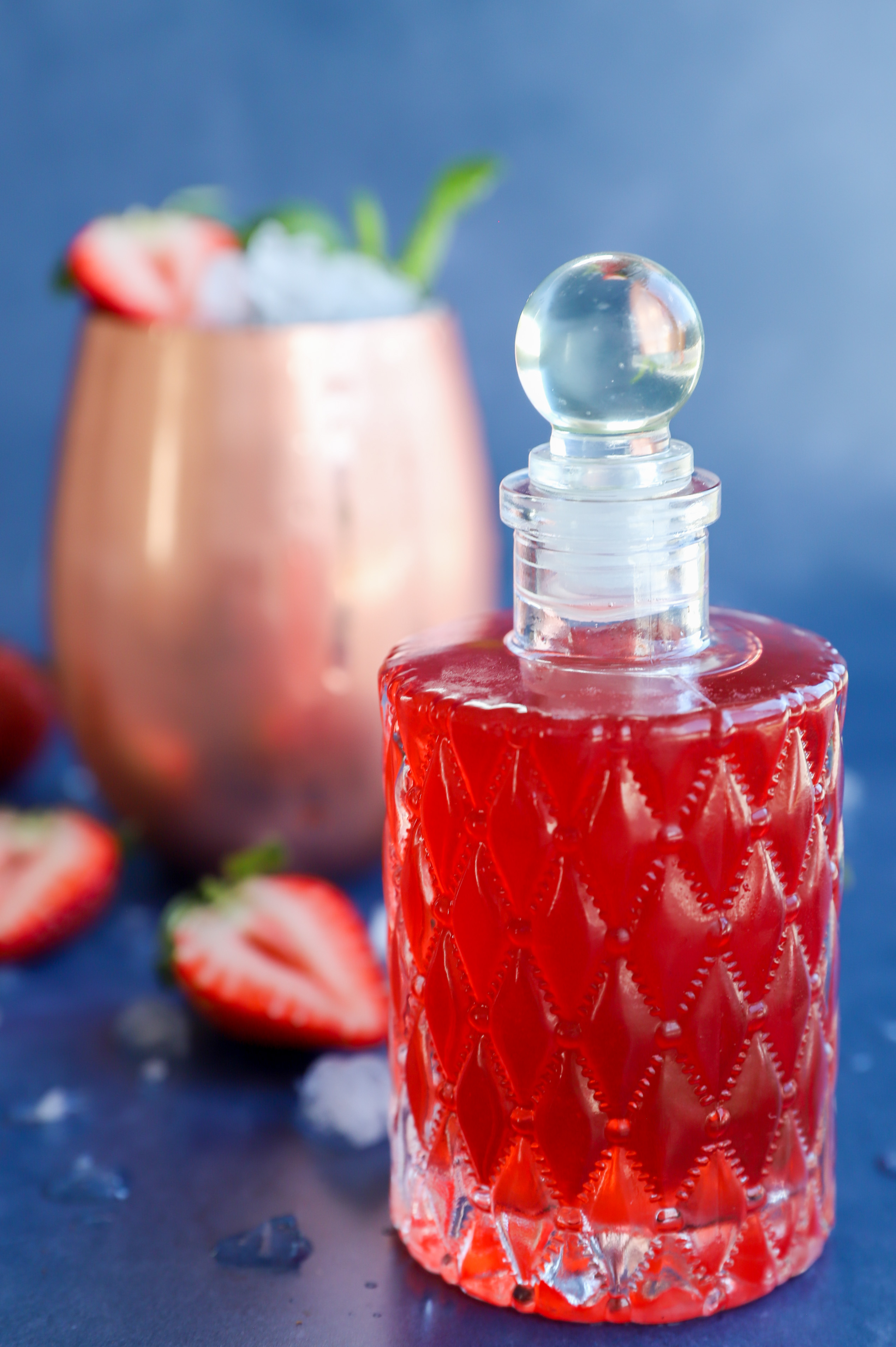 Image of strawberry cocktail and syrup ready to serve