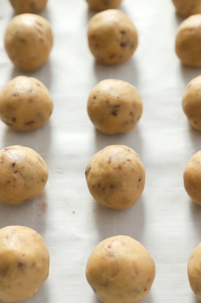 chocolate chip cookie dough bites on parchment paper image