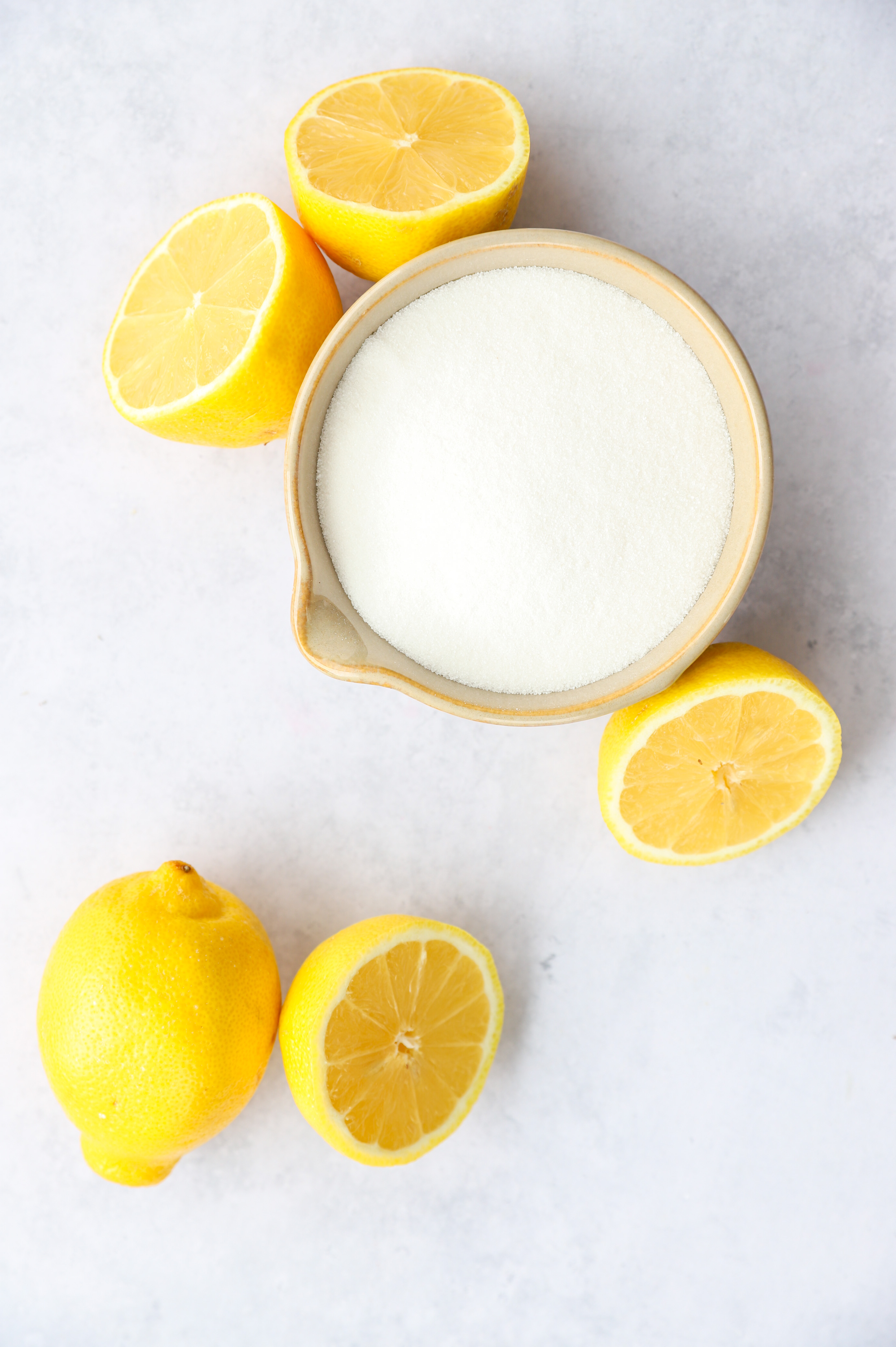 Overhead image of ingredients for lemon simple syrup