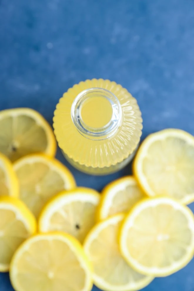 lemon simple syrup in jar overhead image
