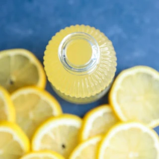 lemon simple syrup in jar overhead image