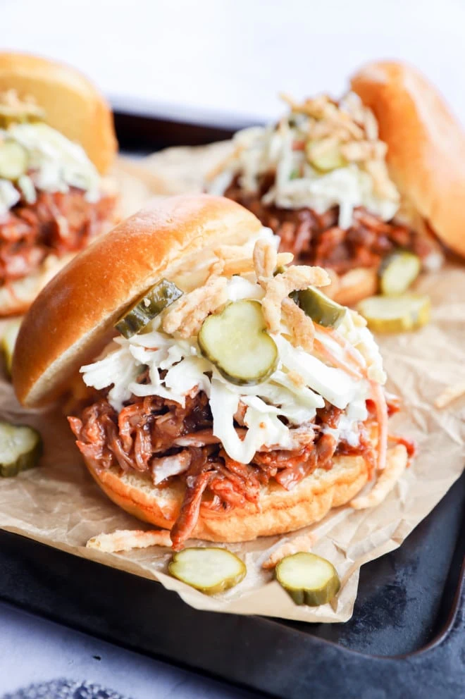 Image of buns with BBQ meat and coleslaw