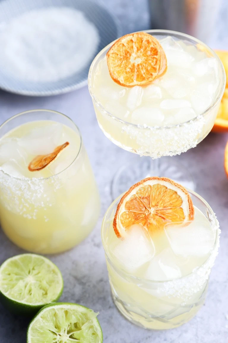 Orange slices garnishing tequila cocktails image