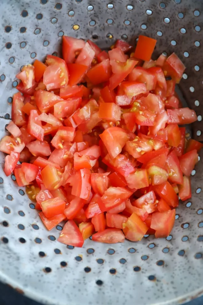 Image of tomatoes draining in a colander
