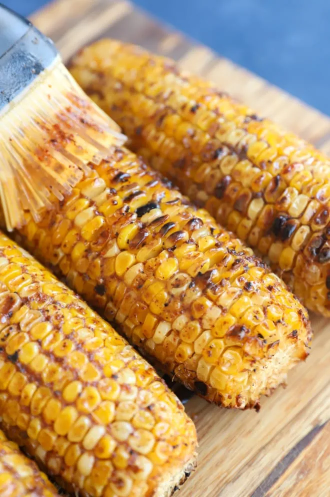 Brushing vegetables with butter mixture image