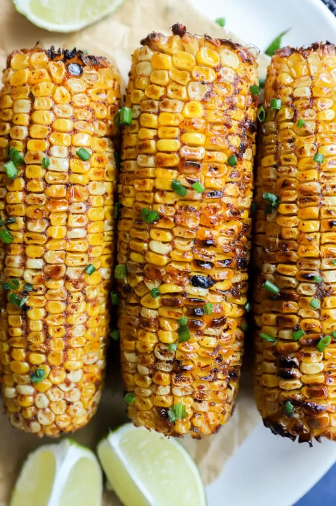 Overhead image of corn on the cob with lime