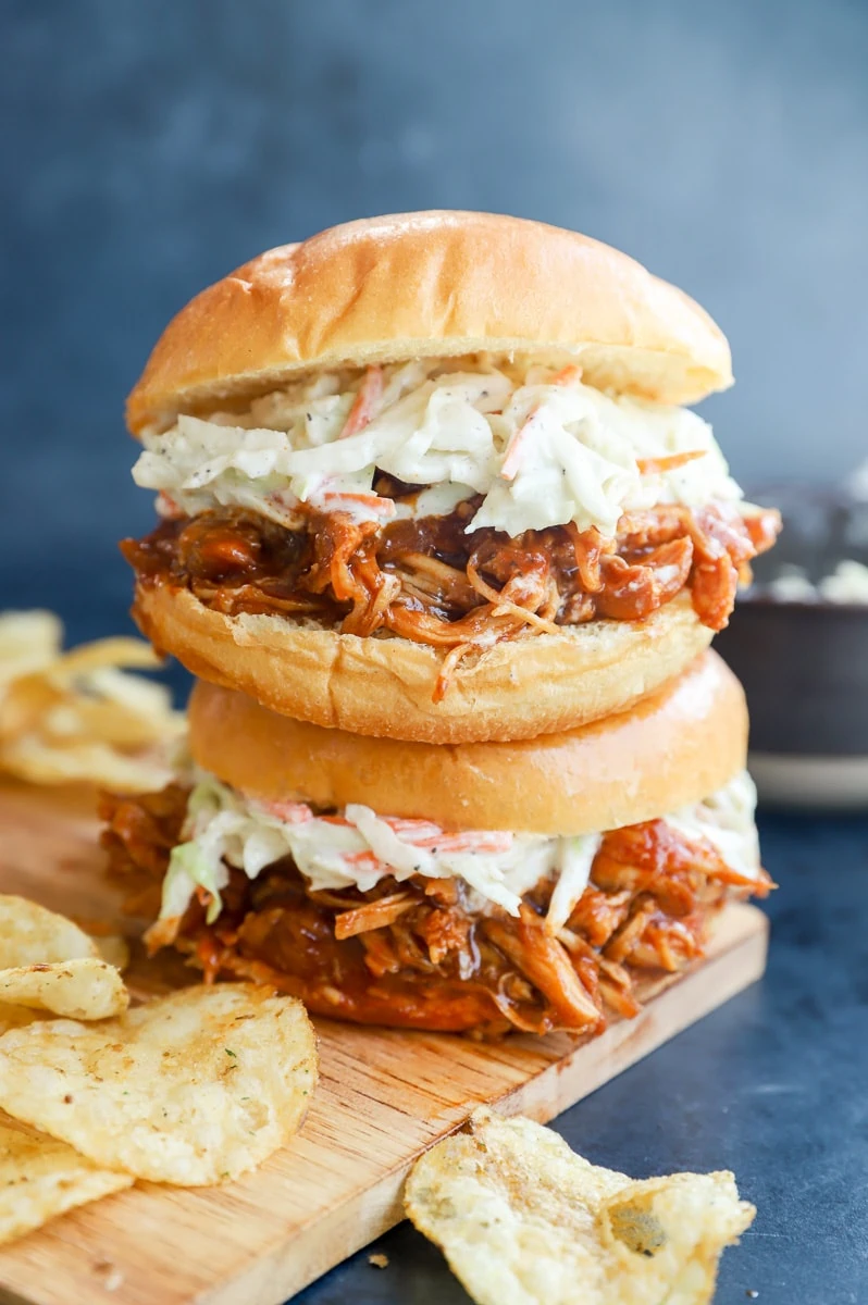 stacked bbq sandwiches with chips image