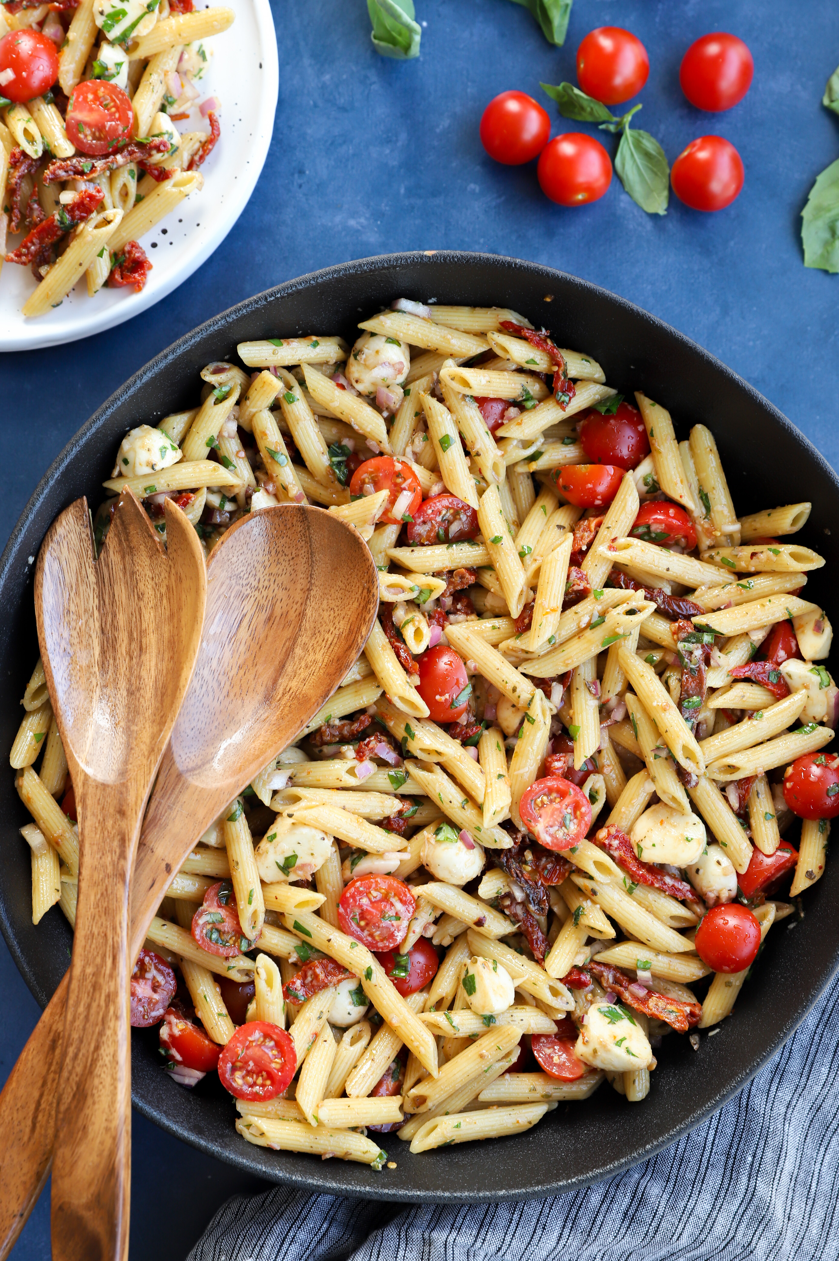 Image of a large serving bowl with a penne cold side dish