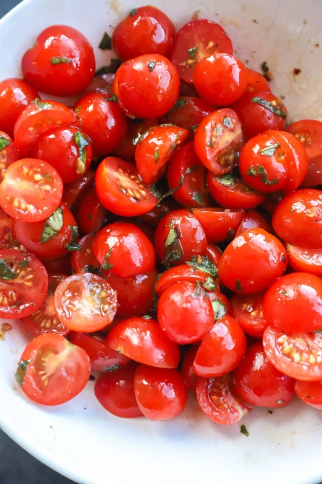 Image of tomatoes in a bowl with dressing
