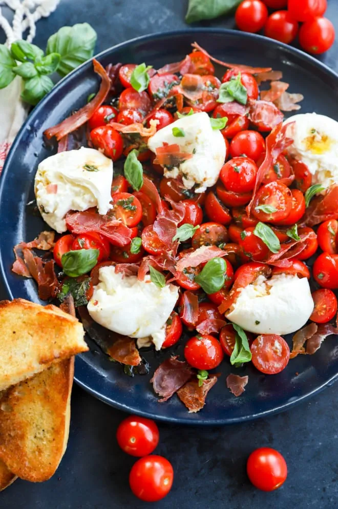 Overhead image of burrata caprese salad