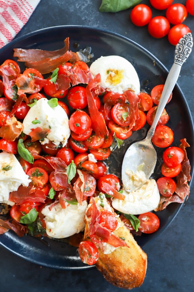 Platter of burrata caprese salad picture