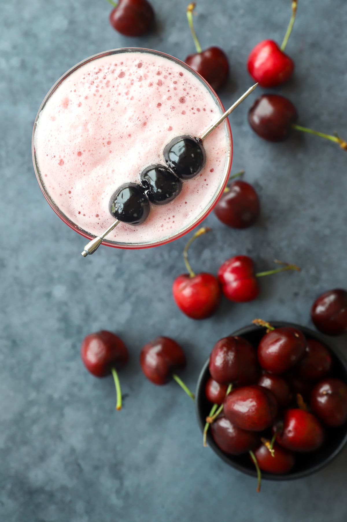 Overhead image of cherry vodka sour