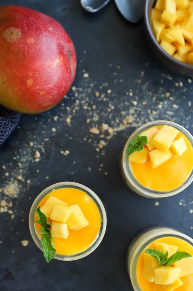 Overhead image of mango mousse cups