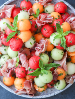 Melon prosciutto salad on platter image
