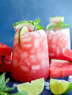 Photo of fruity cocktail in glasses with fresh fruit