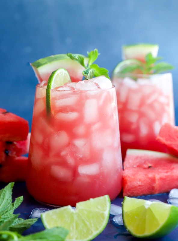 Photo of fruity cocktail in glasses with fresh fruit