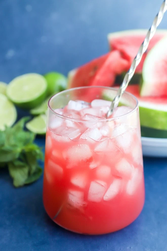 Stirring a watermelon vodka cocktail image