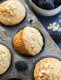 honey oatmeal blackberry muffins in baking pan