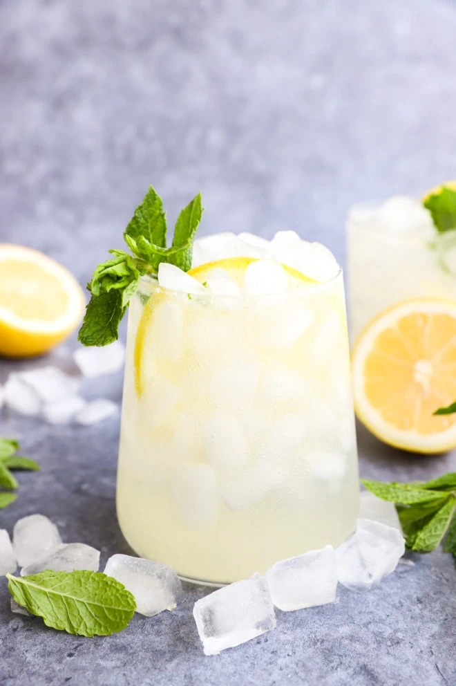 Side photo of citrus mint cocktails in glasses