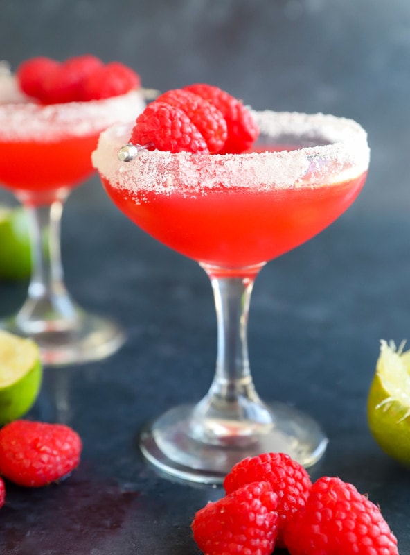 raspberry daiquiri in coupe glass with sugar rim