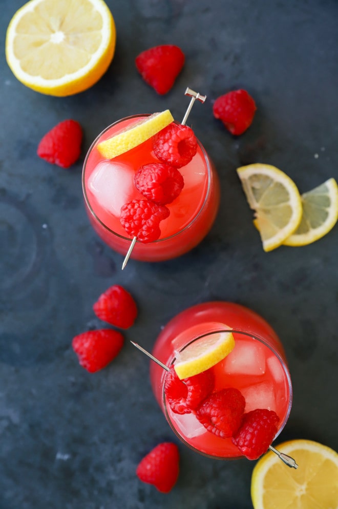 Overhead photo of raspberry cocktail in a glass