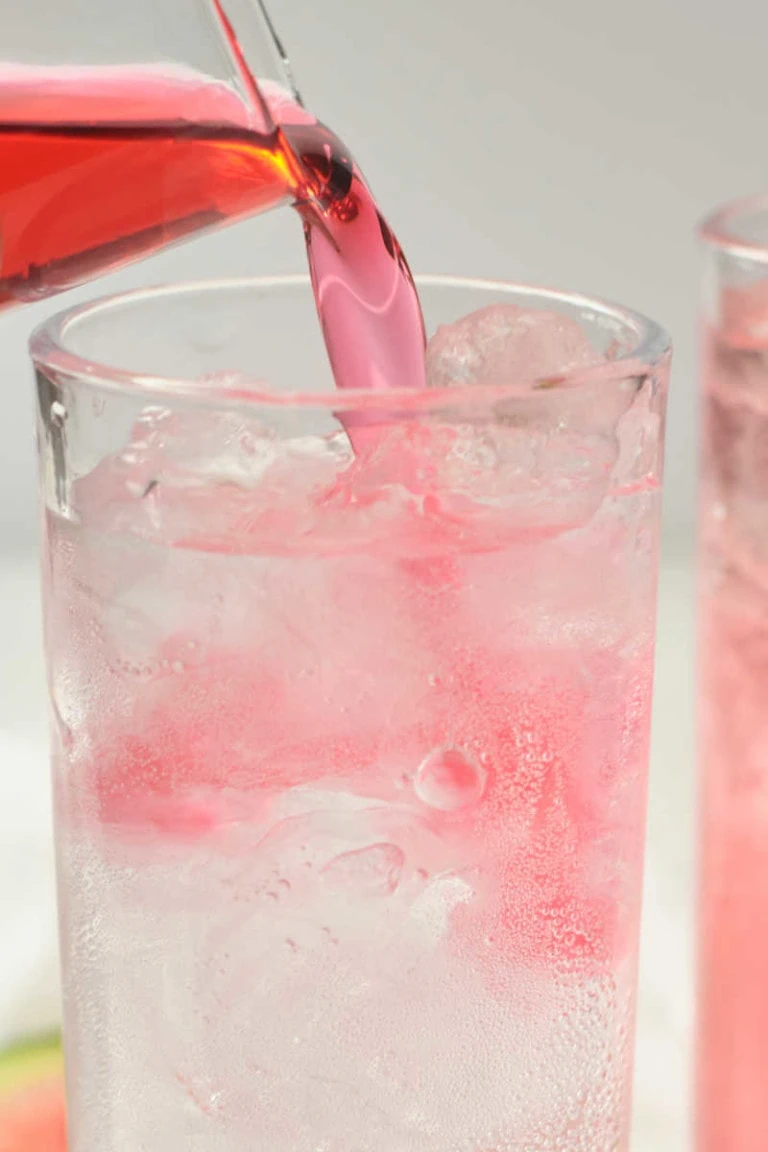 Pouring watermelon soda