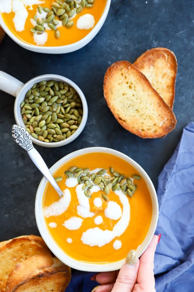 Picture of fall comfort meal in bowls with bread and seeds