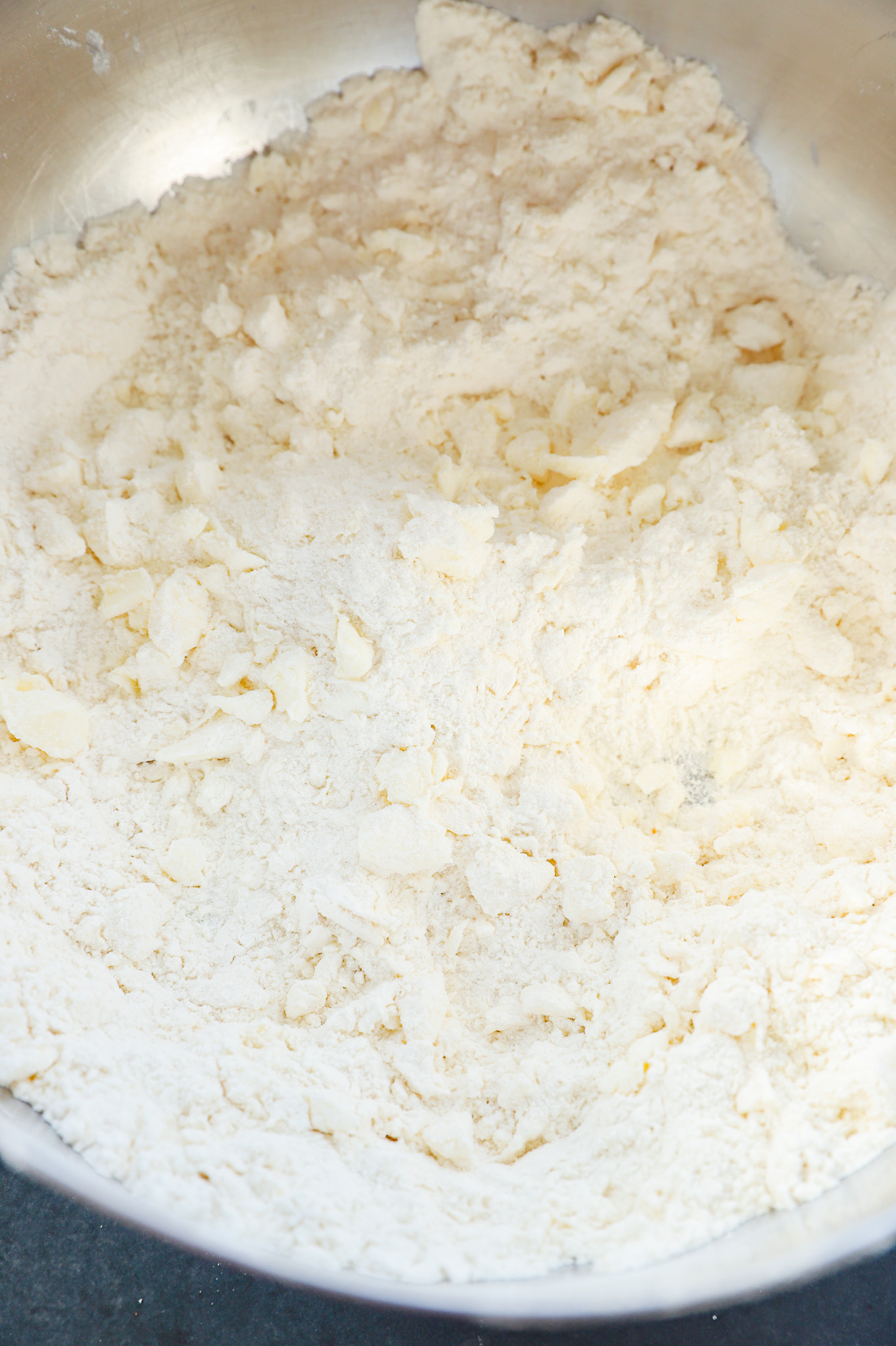 Making honey butter biscuit dough in a bowl