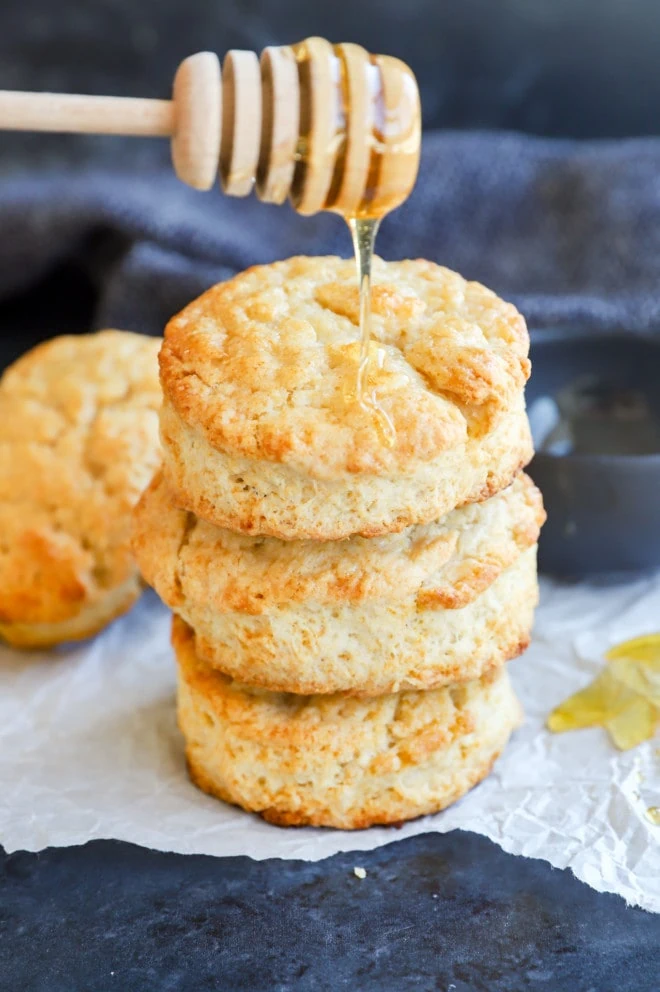 Drizzled honey onto honey butter biscuits