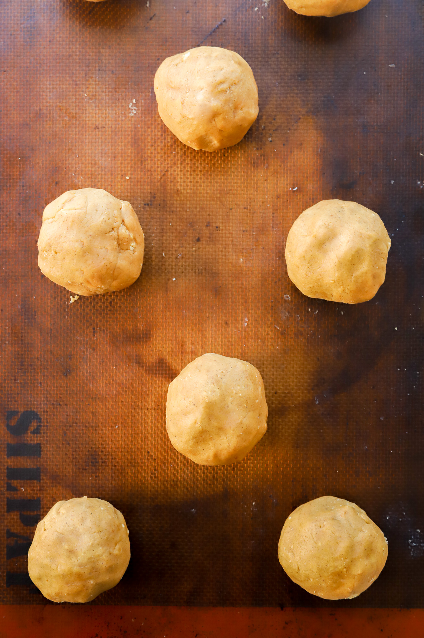 pumpkin cheesecake cookie dough balls before baking
