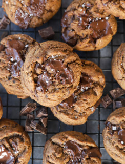 dark chocolate coffee cookies with sea salt on a baking sheet