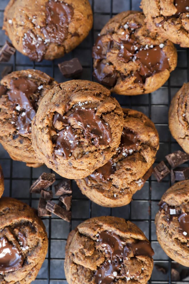 dark chocolate coffee cookies with sea salt on a baking sheet